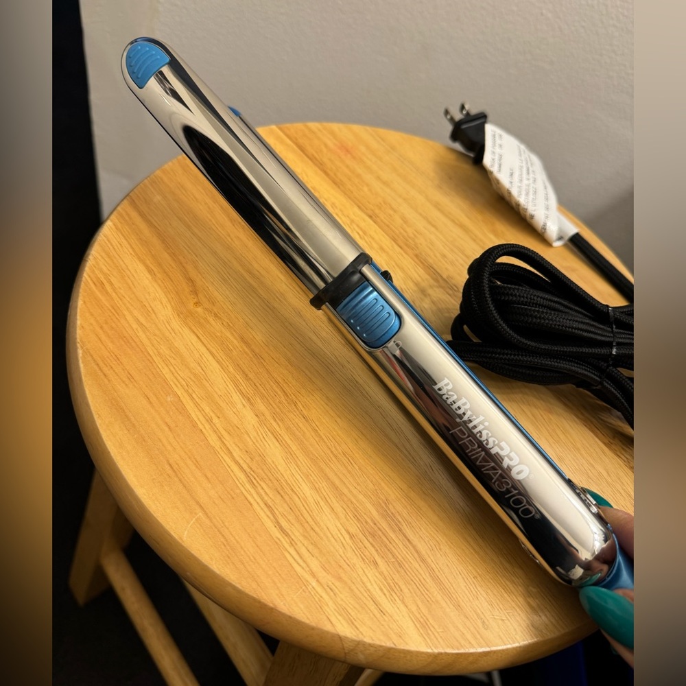 Babyliss Nano Titanium Prima 3000 flat iron.
